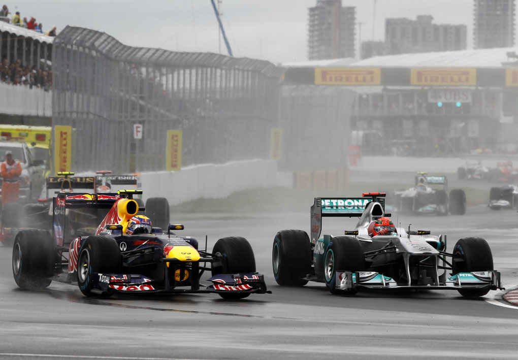 Mark Webber, Red Bull Racing y Michael Schumacher, Mercedes GP